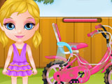 Маленькая Барби на велосипеде